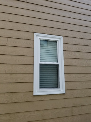 new window with hardie plank siding
