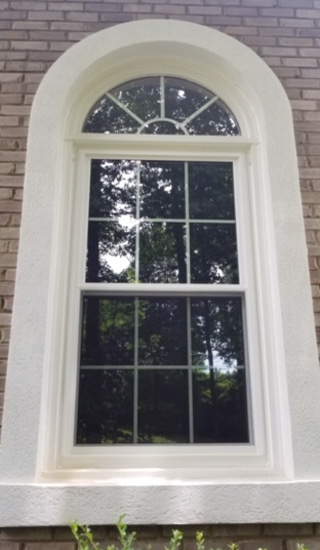 new window with cast stone surround